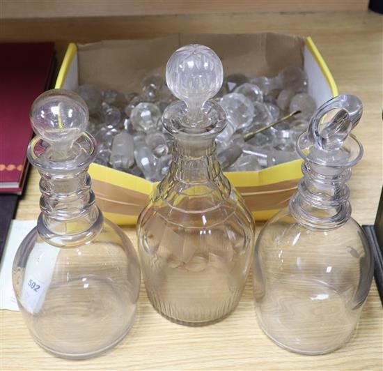 Three Regency decanters and a quantity of stoppers